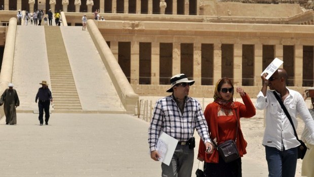 Iranian tourists visit the Temple of Hatshepsut in Luxor on June 3, 2013 (AFP PHOTO / STR)