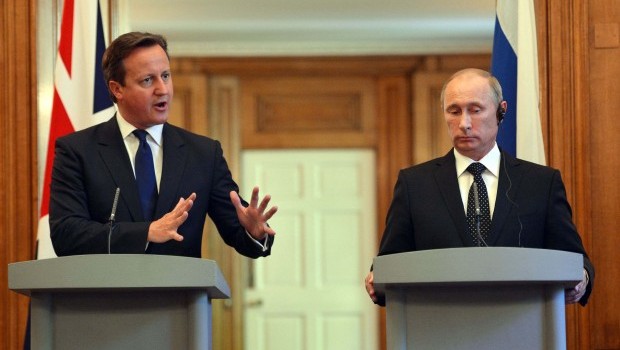 Britain's Prime Minister David Cameron (L) and Russia's President Vladimir Putin hold a joint news conference in 10 Downing Street, central London June 16, 2013. The two leaders met ahead of the G8 summit in Northern Ireland. (REUTERS/Anthony Devlin/Pool)  