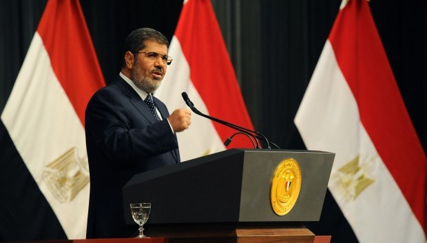 In this Wednesday, June 27, 2013 image released by the Egyptian Presidency, Egyptian President Mohammed Mursi delivers a speech, in Cairo, Egypt. (AP/Egyptian Presidency)