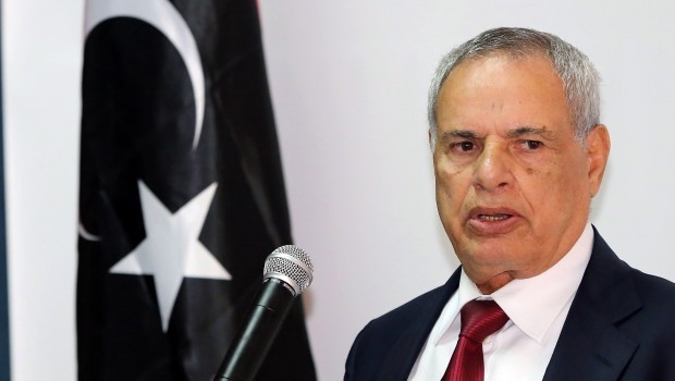 A picture taken on November 27, 2012 shows then newly appointed Libyan Defence Minister Mohammed al-Barghathi speaking during a handover ceremony at the headquarters of the Libyan army chief of staff in Tripoli. Al-Barghathi is to be replaced, Prime Minister Ali Zeidan said on June 27, 2013,  AFP PHOTO/MAHMUD TURKIA.