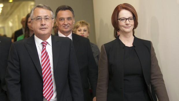 Australia's former prime minister Julia Gillard walks with former deputy prime minister and treasurer Wayne Swan and other supporters after losing a Labor Party vote at Parliament House in Canberra June 26, 2013. Source: Reuters/Andrew Taylor