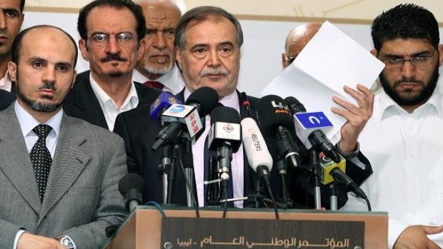General National Congress vice president Jomaa Atiga speaks to the press in Tripoli on June 9, 2013, hours after Libya's army chief resigned a day after clashes killed 31 people in the eastern city of Benghazi. AFP PHOTO/MAHMUD TURKIA