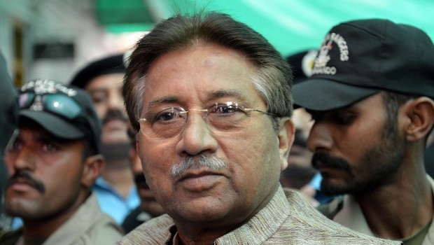In this photograph taken on April 20, 2013, former Pakistani president Pervez Musharraf (C) is escorted by soldiers as he arrives at an anti-terrorism court in Islamabad. Source: AFP Photo/Aamir Qureshi