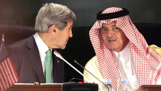 US Secretary of State John Kerry and Saudi Foreign Minister Prince Saud al-Faisal give a joint press conference in Jeddah, on June 25, 2013. AFP PHOTO/STR