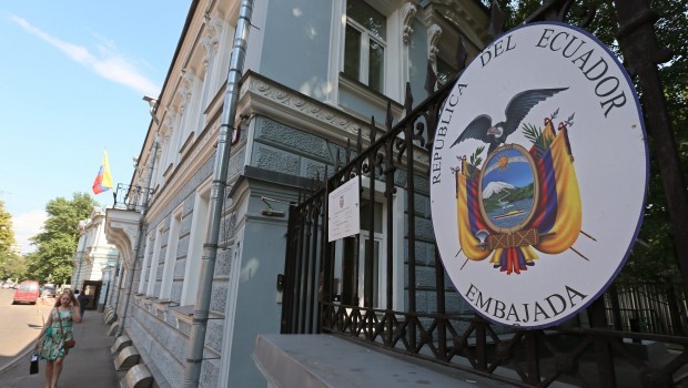A woman passes by the embassy of Ecuador, in Moscow, Russia, 24 June 2013. Source: EPA/Sergei Ilnitsky