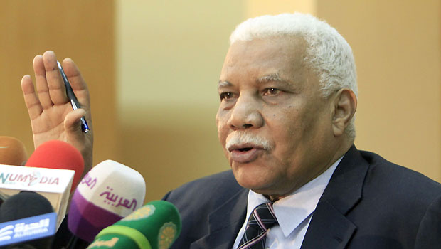 Sudanese Information Minister Ahmed Bilal Osman speaks during a joint press conference with the chief of Sudan's intelligence service Mohammed Atta (unseen) in the Sudanese capital Khartoum on June 9, 2013. (AFP/Ashraf Shazly)