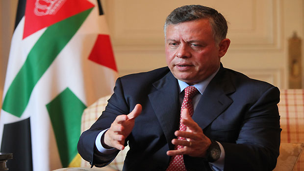 King Abdullah II of Jordan gestures as he speaks to Asharq Al-Awsat editor-in-chief Dr. Adel Al-Toraifi. (Asharq Al-Awsat)