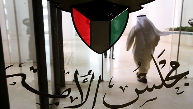 Kuwaiti Shiite MP Ahmed Lari leaves the national assembly in Kuwait City on June 16, 2013. (AFP/Yasser Al-Zayyat)