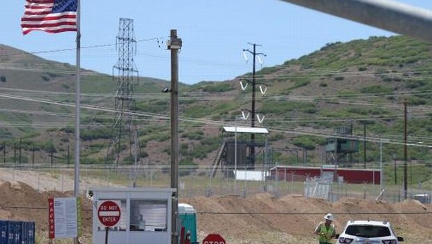 A security guard checks in a car at the US National Security Agency's (NSA) data center that is under construction in Bluffdale, Utah, USA, 07 June 2013. When this data center opens in the Fall of 2013 it will be the largest spy data center for the NSA. (EPA/George Frey)