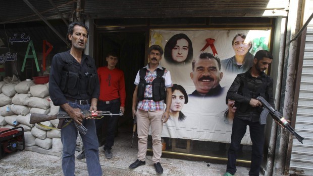 Kurdish fighters from the Popular Protection Units (YPG) are pictured in Aleppo's Sheikh Maqsoud neighbourhood, June 7, 2013. (REUTERS/Muzaffar Salman.) 