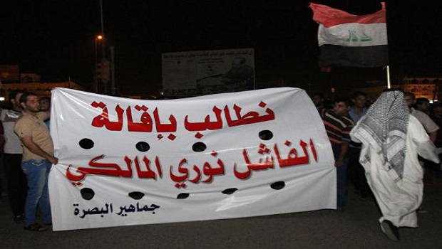 Protesters chant anti-Iraqi government slogans during a protest in Basra, Iraq's second-largest city, 550 kilometers (340 miles) southeast of Baghdad, Iraq, Wednesday, July 24, 2013. (AP Photo/Nabil al-Jurani)