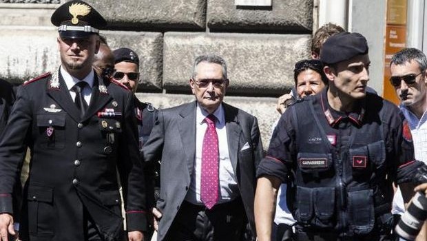 Franco Coppi (C), a lawyer of former Italian Prime Minister Silvio Berlusconi, leaves the Court of Cassation building, in central Rome, 30 July 2013. (EPA/ANGELO CARCONI)