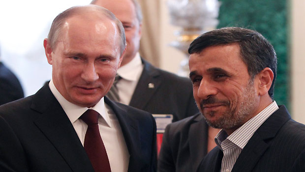 Russia's President Vladimir Putin (L) talks to his Iranian counterpart Mahmoud Ahmadinejad (R) before the Gas Exporting Countries Forum (GECF) at the Kremlin in Moscow, (EPA/Maxim Shemetov)