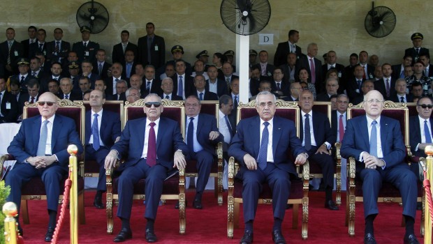 Lebanon's President Michel Suleiman (C), Lebanon's Parliament Speaker Nabih Berri, Prime Minister-designate Tammam Salam (L) and Lebanon's caretaker Prime Minister Najib Mikati (R) attend a graduation parade for Lebanese officer cadets at a military academy in Fayadyeh, near Beirut, marking the 68th Army Day, August 1, 2013. (REUTERS/Sharif Karim.)