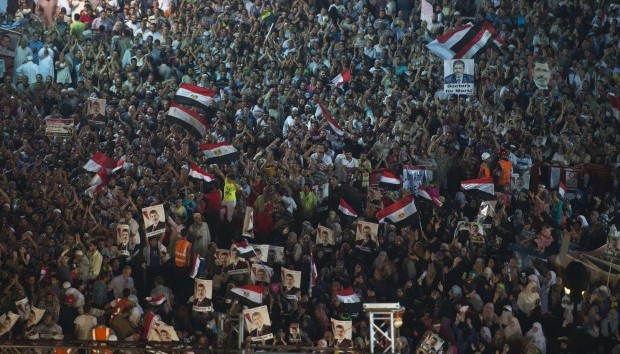 Supporters of Egypt's deposed president Mohamed Mursi gather during their open sit in outside Rabaa Al-Adawiya mosque in Cairo on August 1, 2013. (AFP/Khaled Desouki)