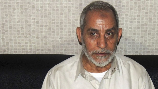 Muslim Brotherhood leader Mohammed Badie sits at a police station after security forces arrested him in Cairo in this handout picture dated August 20, 2013. REUTERS/The Interior Ministry/Handout via Reuters)