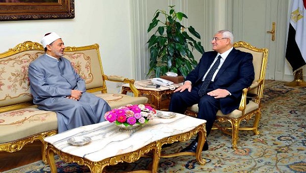 Egyptian interim president Adly Mansour right, meets with Ahmed Al-Tayeb the grand sheikh of Cairo's Al-Azhar, the pre-eminent theological institute of Sunni Islam, at the Presidential Palace in Cairo, Egypt, Wednesday, July 24, 2013. (AP Photo/Mohammed Samaha, Egyptian Presidency)