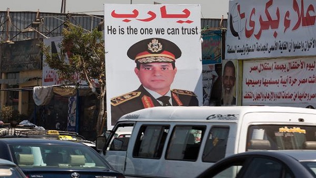 A huge placard depicting Egyptian army chief Abdel-Fattah Al-Sisi is seen in Cairo, Egypt, 01 August 2013. EPA/MICHAEL KAPPELER