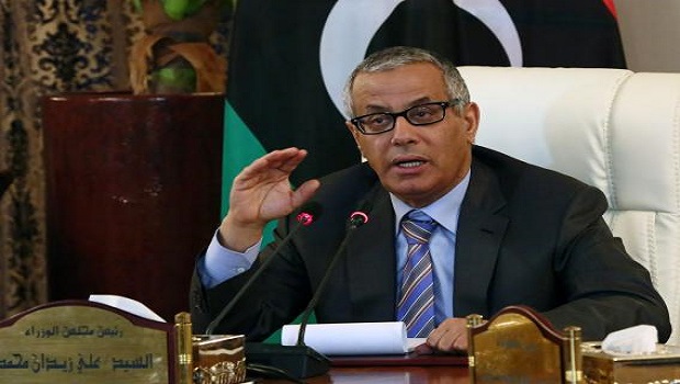 Libyan Prime Minister Ali Zaidan speaks during a press conference with Interior Minister following a rocket attack on a building located in a residential area on July 24, 2013 in Tripoli, Libya. AFP PHOTO MAHMUD TURKIA