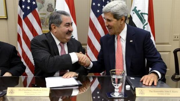 Secretary of State John Kerry (R) and Iraqi Foreign Minister Hoshyar Zebari (L) shake hands after delivering remarks to convene the fourth meeting of the Political and Diplomatic Joint Coordination Committee at the State Department in Washington, DC, USA, 15 August 2013. (EPA/SHAWN THEW)