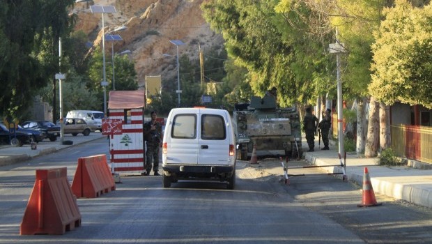 Lebanese army soldiers man a checkpoint following tensions after the killing of four Lebanese men in Bekaa in this June 16, 2013, file photo. (REUTERS/Rami Bleibel)