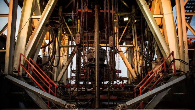 Raven Drilling's oil rig awaits workers on July 28, 2013 outside Watford City, North Dakota. North Dakota has been experiencing an oil boom in recent years, due in part to new drilling techniques including hydraulic fracturing and horizontal drilling. (Andrew Burton/Getty Images/AFP)