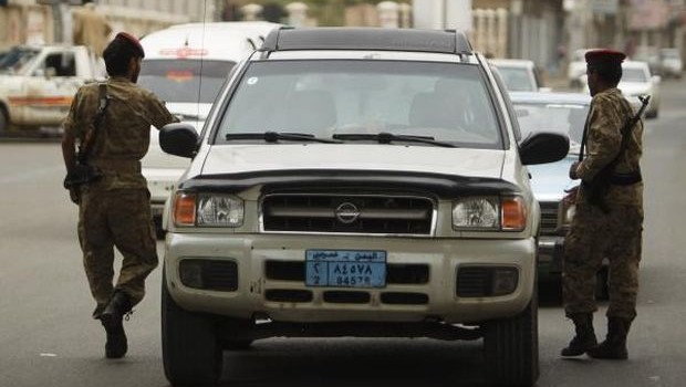 Army troopers man a checkpoint in Sanaa August 5, 2013. (REUTERS/Khaled Abdullah)