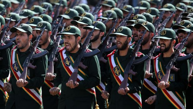 Iranian revolutionary guard soldiers march during the annual military parade marking the Iraqi invasion in 1980, which led to an eight-year-long war (1980-1988) in Tehran, Iran, on September 22, 2013. (EPA/Abedin Taherkenareh)