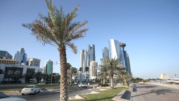Skyscrapers tower along the Corniche in the Qatari capital Doha, on September 22, 2013. (AFP Photo/Al-Watan/Karim Jaafar)