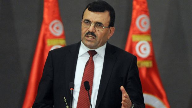 Tunisian Prime minister Ali Laarayedh speaks during a meeting as part of the dialogue between Tunisia's ruling Islamists and the opposition aimed at ending a two-month crisis on October 5, 2013 at the Palais des Congres in Tunis. (AFP Photo/Fethi Belaid)