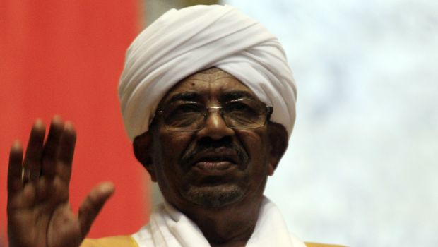 Sudan's President Omar al-Bashir gestures as he gives an address at the opening of the eighth session of Parliament in Khartoum on October 28, 2013.(Reuters/Mohamed Nureldin Abdallah)
