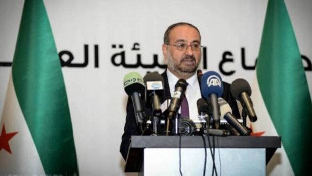 Prime Minister of the Syrian opposition’s interim government Ahmed Tu'mah, speaks at the National Coalition of Syrian and Revolution and Opposition Forces ahead of his election to the post on September 14, 2013 (AFP)
