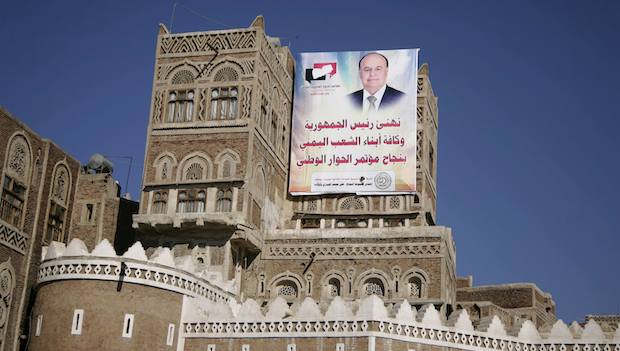 A poster of Yemen's President Abd-Rabbu Mansour Hadi is seen on a house in Sana'a on February 1, 2014. (REUTERS/Khaled Abdullah)