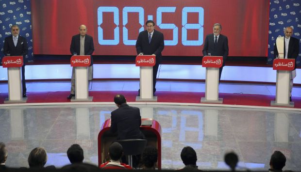 Afghan presidential candidates (L-R) Abdullah Abdullah, Qayum Karzai, Abdul Rahim Wardak, Zalmai Rassoul and Ashraf Ghani Ahmadzai participate in the first presidential election debate at a local TV channel studio in Kabul February 4, 2014. (Reuters/Omar Sobhani)