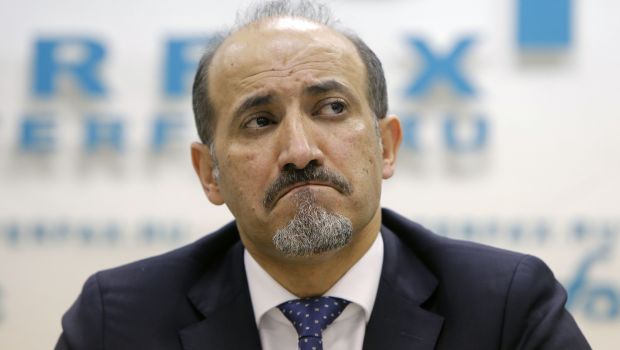 Syrian opposition leader Ahmad Jarba reacts during a news conference in Moscow February 4, 2014. (REUTERS/Maxim Shemetov)