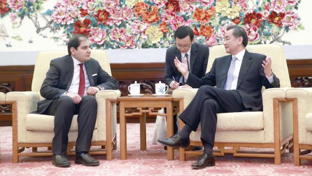 Chinese Foreign Minister Wang Yi (right) speaks to Asharq Al-Awsat Editor Adel Al Toraifi in Beijing in March 2014 (Asharq Al-Awsat)