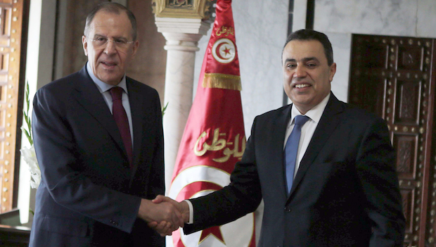 Tunisian Prime Minister Mehdi Jomaa (R), greets Russian Foreign Minister Sergey Lavrov in Tunis on March 4, 2014.  (AP Photo/Hassene Dridi)