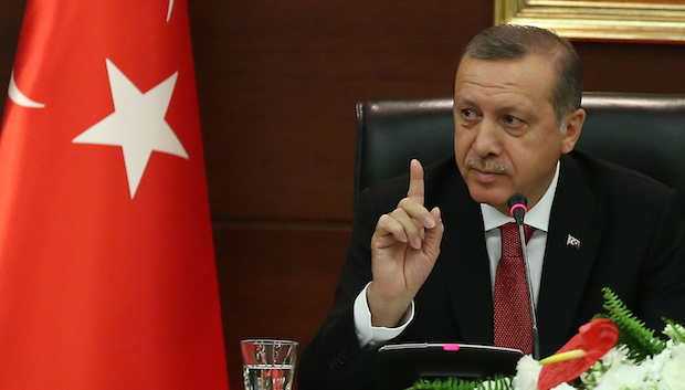 Turkish Prime Minister Recep Tayyip Erdogan speaks to the media in his office in Ankara on April 23, 2014. (AP Photo)