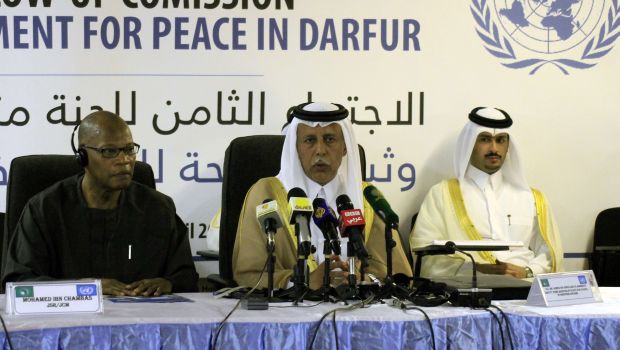 Qatar's Deputy Prime Minister Ahmed bin Abdullah al-Mahmud (C) chairs on April 28, 2014 a meeting of an international commission monitoring a limited peace deal in Sudan's Darfur, in el-Fasher, northern Darfur. (AFP PHOTO/ASHRAF SHAZLY)