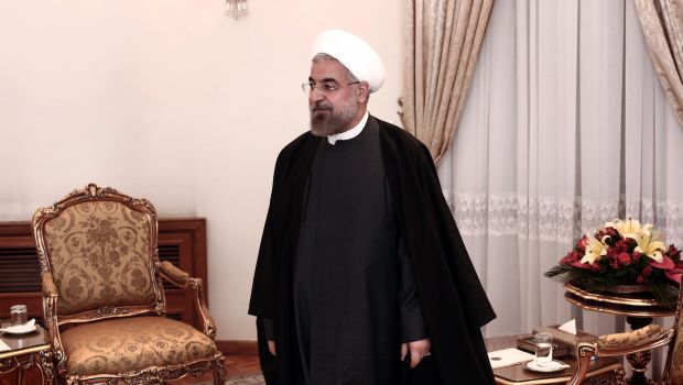 Iranian President Hassan Rouhani waits to meet with the Director-General of UNESCO, Irina Georgieva Bokova (Unseen) in Tehran, on April 29, 2014. (AFP PHOTO/BEHROUZ MEHRI)
