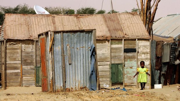 A Mauritanian girl stands outside her family's shack in a shanty town in Nouakchott's El-Mina quarter, which is mainly inhabited by the descendants of slaves. Georges Gobet/AFP/Getty Images)