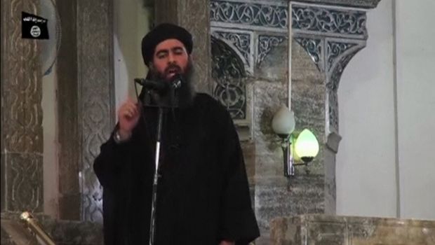 A man purported to be the reclusive leader of the militant Islamic State Abu Bakr al-Baghdadi has made what would be his first public appearance at a mosque in the centre of Iraq's second city, Mosul, according to a video recording posted on the Internet on July 5, 2014, in this still image taken from video. (Reuters/Social Media Website via Reuters TV)