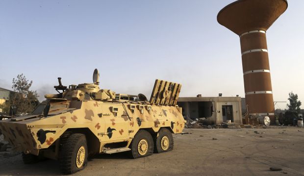 An armored vehicle is seen after fighting between Libyan special forces and ex-rebel fighters of the Benghazi Shura Council in the eastern city of Benghazi on July 30, 2014. (Reuters/Stringer)