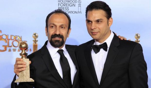 Director Asghar Farhadi (L) and actor Peyman Moadi pose with the award for ‘Best foreign film’ for "A Separation" at the Golden Globes in Los Angeles, United States, on January 15, 2012. (Reuters/Lucy Nicholson)