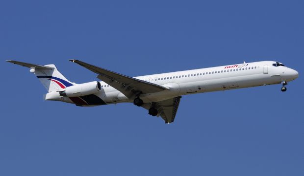 A Swiftair MD-83 airplane is seen in this undated photo, the same type of aircraft as the missing Air Algerie plane. (Reuters/Xavier Larrosa)