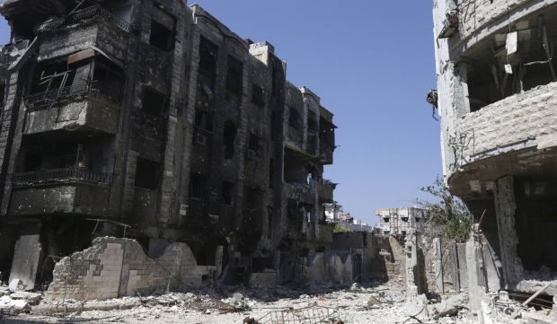 A general view shows damaged buildings in Jobar, a suburb of Damascus, on July 18, 2014.  (REUTERS/Bassam Khabieh)