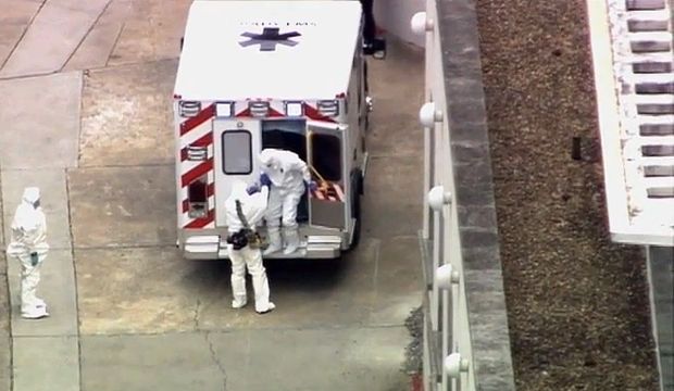An ambulance arrives with Ebola victim Dr. Kent Brantly (R) at Emory University Hospital In Atlanta, on Saturday, August 2, 2014. (AP Photo/WSB-TV Atlanta)