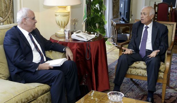 Arab League Secretary-General Nabil Elaraby (L), right, meets with chief Palestinian negotiator, Saeb Erekat, in Cairo, Egypt, Monday, August 11, 2014. (AP Photo/Amr Nabil)