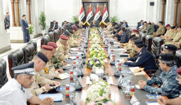 Outgoing Iraqi Prime Minister Nuri Al-Maliki meeting with senior military and police officers. (Handout, Iraqi PM's office)