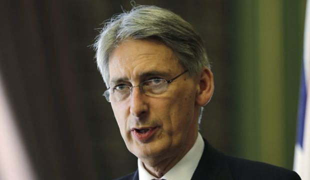 British Foreign Secretary Philip Hammond speaks during a joint press conference with Egyptian Foreign Minister Sameh Shukri, following their meeting at the Egyptian foreign ministry in Cairo, on July 24, 2014 (AP Photo/Amr Nabil, File)